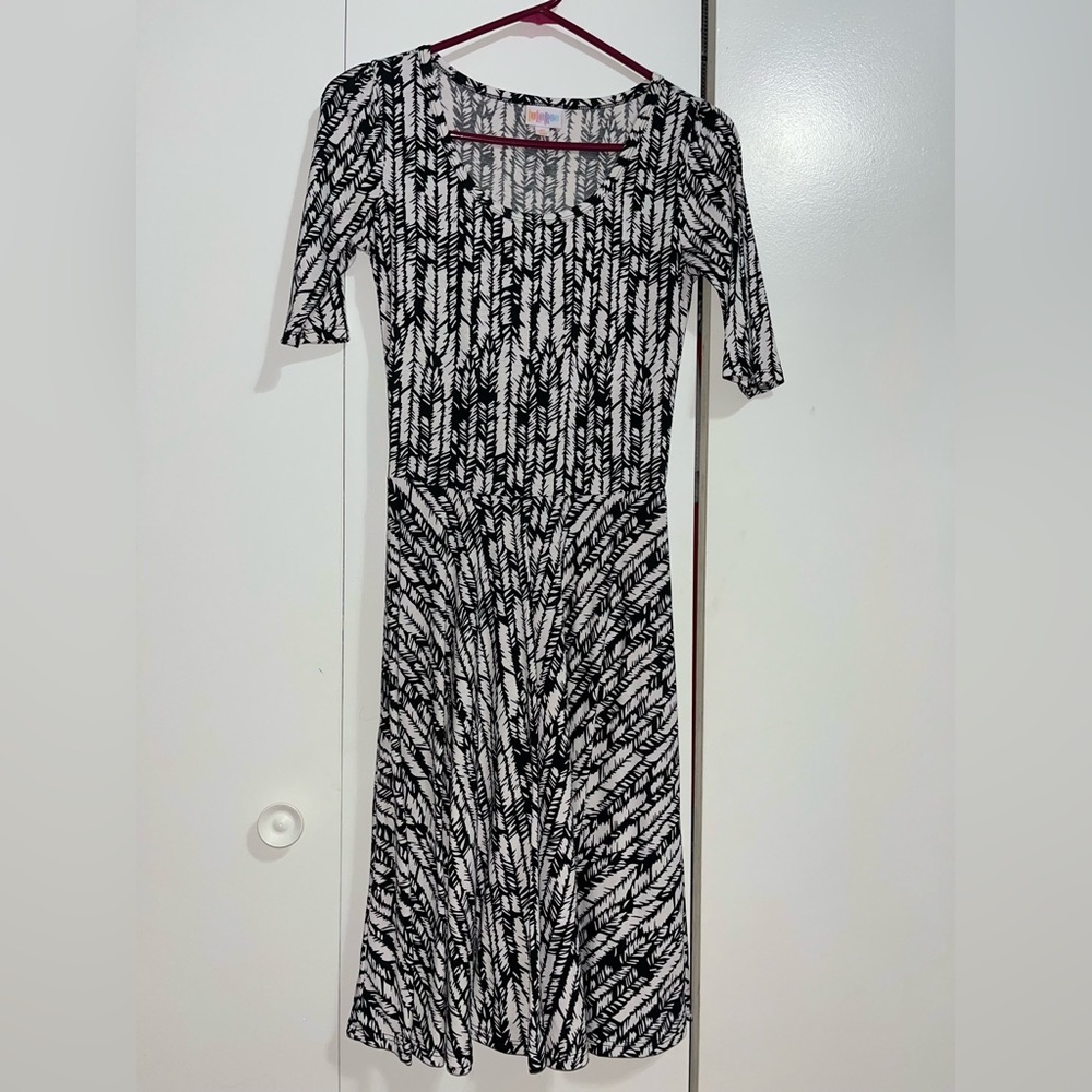 LuLaRoe Dress! Perfect for any occasion! Pair it with a cardigan or a belt.